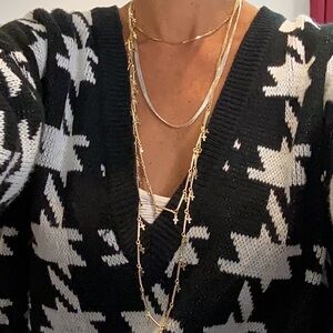 N27. Express Gold Multi Chain W/crosses Necklace